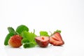 Fresh, ripe, juicy and mouth-watering strawberries with green leaves Royalty Free Stock Photo