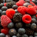 Fresh ripe juicy organic blueberries, raspberries, blackberries, close up image Royalty Free Stock Photo