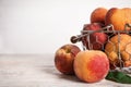 Fresh ripe juicy peaches on white wooden table, closeup. Space for text Royalty Free Stock Photo