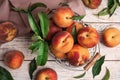 Fresh ripe juicy peaches on white wooden table, flat lay Royalty Free Stock Photo