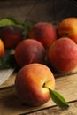 Fresh ripe juicy peaches on wooden table, closeup Royalty Free Stock Photo