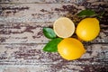 Fresh ripe lemons on wooden table. Royalty Free Stock Photo