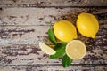 Fresh ripe lemons on wooden table. Royalty Free Stock Photo