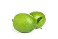 Fresh ripe limes with green leaf isolated Royalty Free Stock Photo