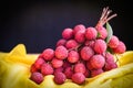 fresh ripe lychee fruit tropical fruit peeled lychees slice in Thailand, lychees on table and black background Royalty Free Stock Photo