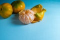 Fresh ripe mandarins isolated on blue background Royalty Free Stock Photo
