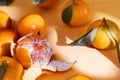 Fresh ripe mandarins on orange background Royalty Free Stock Photo