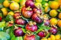 Fresh ripe mangosteens and other seasonal fruits at the La Boqueria market