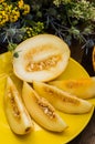 Fresh and ripe melon. Wooden background. Top view. Close-up