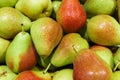 Fresh ripe multi-colored pears in a box Royalty Free Stock Photo