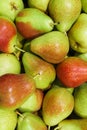 Fresh ripe multi-colored pears in a box Royalty Free Stock Photo