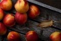 Fresh ripe nectarine in a box on a wooden table Royalty Free Stock Photo