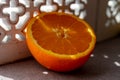 Fresh ripe orange citrus fruit and andalusian ornament on background