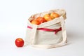 Fresh Ripe Organic Apple In Trendy Cotton Eco Bag On White Background. Concept Of Zero Waste.