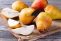 Fresh ripe organic pears on a wooden table