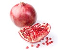 Fresh, ripe, organic pomegranate fruit on white background. Royalty Free Stock Photo