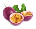 Fresh ripe passion fruits maracuyas with green leaf isolated