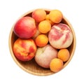 Fresh ripe peaches, apricots and nectarines in wooden bowl isolated on a white background.  Top view, close-up Royalty Free Stock Photo