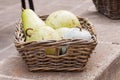 Fresh ripe pears in a wicker basket