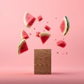 Fresh ripe pieces watermelon flying over wooden board on pink background.