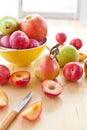 Fresh ripe plums, apples and pears