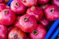 Fresh ripe pomegranates in the box Royalty Free Stock Photo