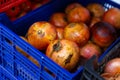 Fresh ripe pomegranates in box for sale Royalty Free Stock Photo