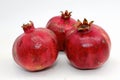 Fresh Ripe Pomegranates on White Background Royalty Free Stock Photo