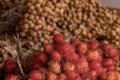Fresh and ripe rambutan fruits lies in the local market