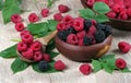 Fresh ripe raspberries and blackberries on a wooden table. summer healthy berries Royalty Free Stock Photo