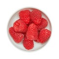 Fresh ripe raspberries in ceramic bowl isolated on white background. Ingredients for cooking. Top view. Royalty Free Stock Photo