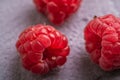 Fresh ripe raspberry fruit, summer vitamin red berry fruit on stone concrete background Royalty Free Stock Photo