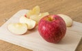 Fresh Ripe Red Apple on Wooden Cutting Board Royalty Free Stock Photo