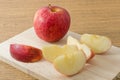 Fresh Ripe Red Apple on A Wooden Cutting Board Royalty Free Stock Photo