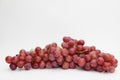 Fresh and ripe red grapes isolated in white background. Bunch of raw and juicy grapevines Royalty Free Stock Photo