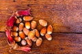 Fresh ripe red hazelnuts on wooden table Royalty Free Stock Photo