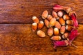 Fresh ripe red hazelnuts on wooden table Royalty Free Stock Photo