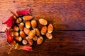 Fresh ripe red hazelnuts on wooden table Royalty Free Stock Photo