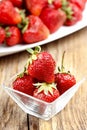 Fresh ripe strawberries in glass bowl Royalty Free Stock Photo