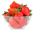 Fresh and ripe strawberries in a transparent glass round bowl isolated on white background Royalty Free Stock Photo