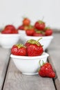 Fresh ripe strawberries in white ceramic bowl Royalty Free Stock Photo