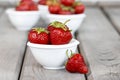 Fresh ripe strawberries in white ceramic bowl Royalty Free Stock Photo