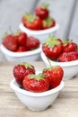 Fresh ripe strawberries in white ceramic bowl Royalty Free Stock Photo