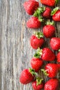 Fresh ripe strawberries on a wooden background. Organic juicy berries Royalty Free Stock Photo