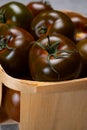 Fresh ripe sweet reddish brown and green kumato tomatoes