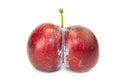 Fresh ripe twinned plum isolated on white Royalty Free Stock Photo