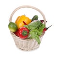 Fresh ripe vegetables and fruit in wicker basket on white background Royalty Free Stock Photo