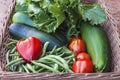 Fresh ripe vegetables in old wicker basket Royalty Free Stock Photo