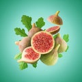 Fresh ripe whole and cut Figs with leaves on bright background. Minimal food concept Royalty Free Stock Photo