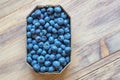Fresh ripe whortleberries in cardboard box from market. Copy space Royalty Free Stock Photo